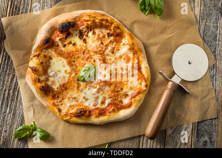 Homemade Traditional Neopolitan PIzza with Cheese and Basil Stock Photo