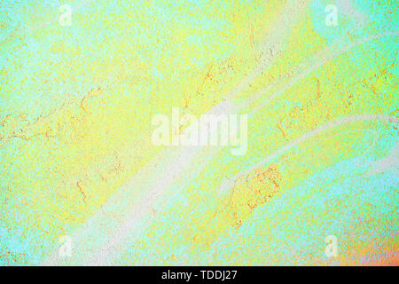 Abstract neon colorful fluid art on concrete background. Digital modern art. Flowing green, pink and yellow colors. Stock Photo