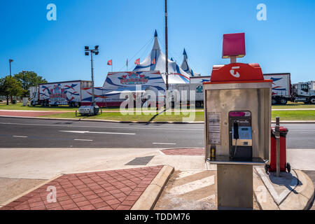 Broome, WA, Australia - Telstra landline phone booth in front of the Moscow circus tent Stock Photo