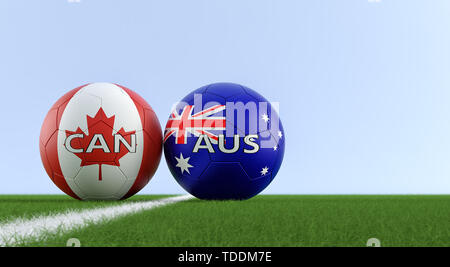 Canada vs. Australia Soccer Match - Soccer balls in Australia and Canada national colors on a soccer field. Copy space on the right side - 3D Renderin Stock Photo