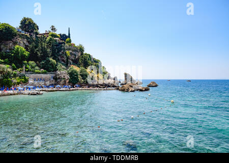 Antalya, Turkey - May 19, 2019: Antalya coast stone embankment and beach Stock Photo