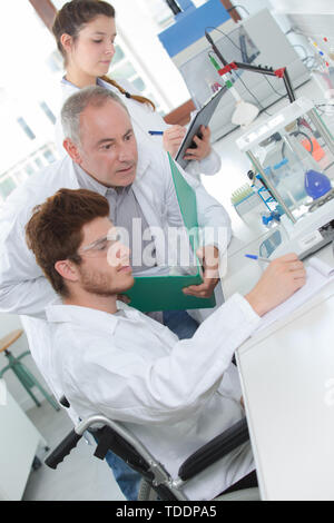 students using modern technology tools during class Stock Photo