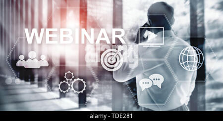 Inscription on virtual screen: Webinar. Abstract business background. Stock Photo