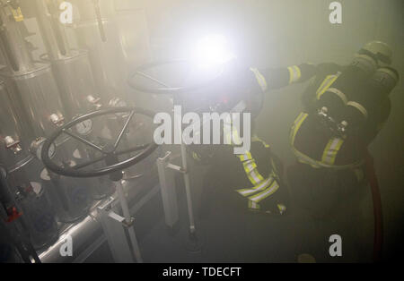 Bornholm, Denmark. 14th June, 2019. Marines fight a fire during an exercise in the task force provider 'Bonn', which operates near the Danish island of Bornholm. The ship of the German Navy takes part in the Nato manoeuvre 'Baltops' on the Baltic Sea. Credit: Axel Heimken/dpa/Alamy Live News Stock Photo