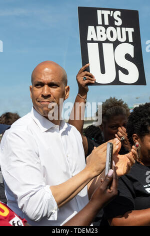 Charleston, United States. 15th June, 2019. Democratic presidential hopeful Sen. Cory Booker joins McDonals workers in a one day strike as part of the Fight for $15 dollar minimum wage effort by a consortium of trade unions outside a McDonald's restaurant June 15, 2019 in Charleston, South Carolina. Credit: Planetpix/Alamy Live News Stock Photo