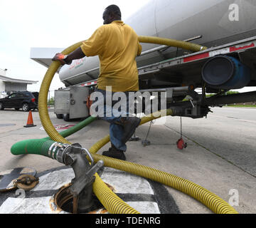 Racine, Wisconsin, USA. 15th June, 2019. LYRONZO HALL delivers a load of gasoline from Milwaukee to the MJ Petro gas station in Racine, Wisconsin Saturday June 15, 2019. Although gasoline prices are lower in recent days, the price of oil may negatively impact gasoline prices as tensions simmer between Iran and the United States. Credit: Mark Hertzberg/ZUMA Wire/Alamy Live News Stock Photo