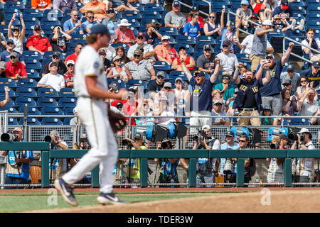 Omaha, NE U.S. 15th June, 2019. Michigan fans react to the final out as relief pitcher Jeff Criswell #17 clinches his fist in action during game 1 of the 2019 NCAA Men's College World Series between Texas Tech Red Raiders and Michigan Wolverines at the TD Ameritrade Park in Omaha, NE.Attendance: 24,148.Michigan won 5-3.Michael Spomer/Cal Sport Media. Credit: csm/Alamy Live News Stock Photo