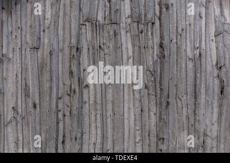 gray wooden weathered barn wall flat background template. Stock Photo
