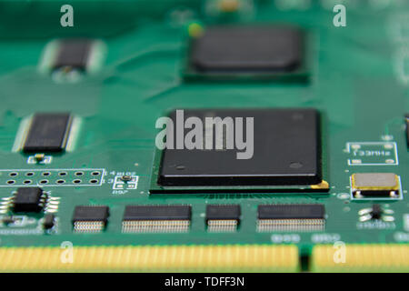 Close-up of an integrated chip (IC) on a Printed Board (PCB) Stock Photo