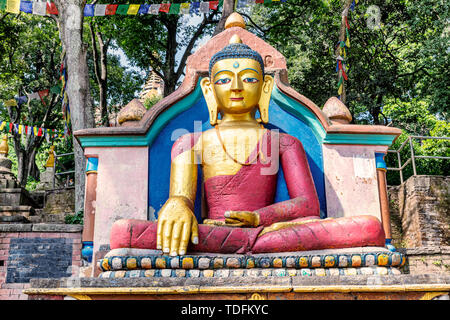 Buddha statue  withe a gesture of calling the earth to witness. It is located by the stairs when going up to Swayambhunath Stupa in Kathmandu, Nepal. Stock Photo