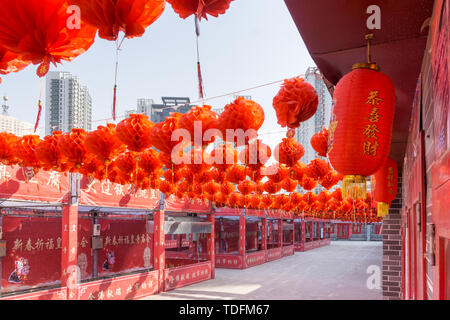 Antique buildings and red lanterns at the Imperial Temple Fair in Shenyang, China Stock Photo