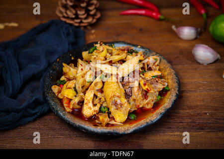 drooling chicken, stick chicken. Stock Photo