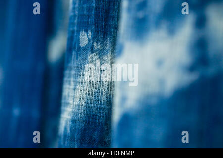 Batik braid glowing dots abstract background Stock Photo
