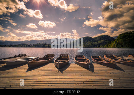 Beautiful landscape of wooden boats near the lake Bled, Bled, Slovenia in summer Stock Photo