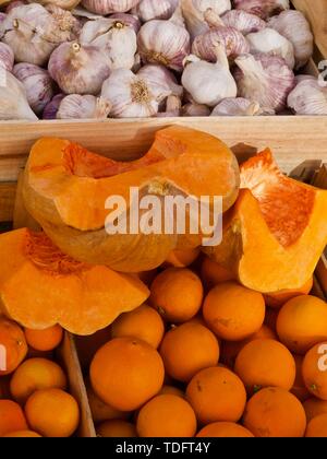 Open sweet orange melon at a fruit market Stock Photo