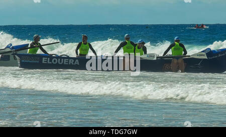 ALEXANDRA HEADLAND, QUEENSLAND, AUSTRALIA- APRIL 21, 2016: a cheeky shot of a surf boat crew waiting for the start of a race on the sunshine coast of  Stock Photo