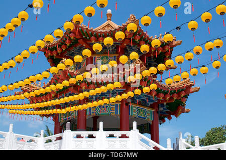 Kuala Lumpur, Malaysia - 10th May 2019 : Low angle view of the yellow lantern decoration and the beautiful Pagoda of the Thean Hou Temple in Kuala Lum Stock Photo