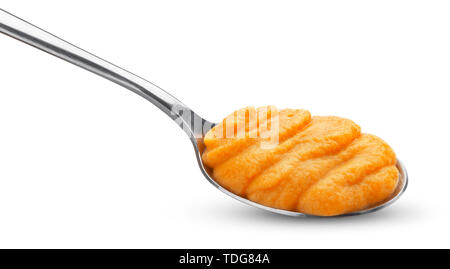 Pumpkin and carrot baby puree in spoon isolated on white background Stock Photo