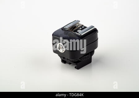 Hot shoe flash trigger sync adapter Stock Photo