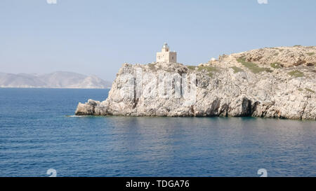 a lighthouse in ormos harbor on the island of ios, greece Stock Photo