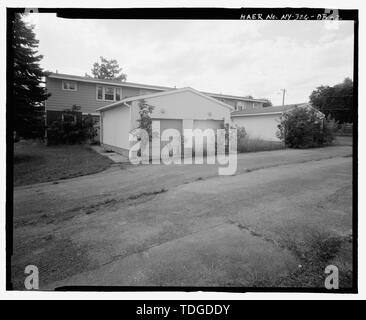 NORTHEAST (FRONT) AND SOUTHEAST (SIDE) ELEVATIONS OF BUILDING. VIEW TO WEST. - Plattsburgh Air Force Base, Capehart Four-Family Home, Idaho Avenue North, Plattsburgh, Clinton County, NY Stock Photo