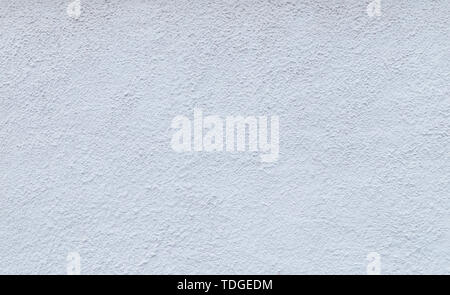 High resolution full frame background of a rough plastered concrete wall in light blue or white color. Stock Photo