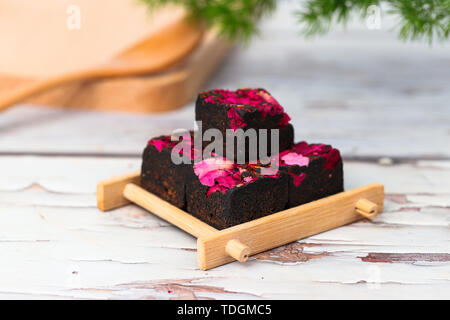 Rose, black sugar, rose, brown sugar. Stock Photo