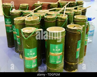 Bamboo wooden cup with traditional drink sold at night market Stock Photo -  Alamy