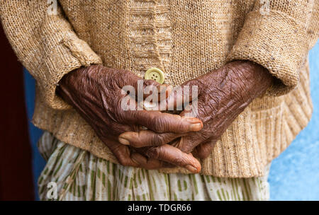 An Old Womans Hands Clasped and Relaxed Close-up. Stock Photo