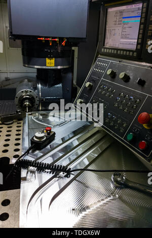 Measuring process with ruby touch probe on large CNC milling machine in jog mode. Stock Photo