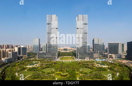 The surface building of the East High-speed Railway Station in Zhengzhou, the twin towers in the center of the green space. Stock Photo