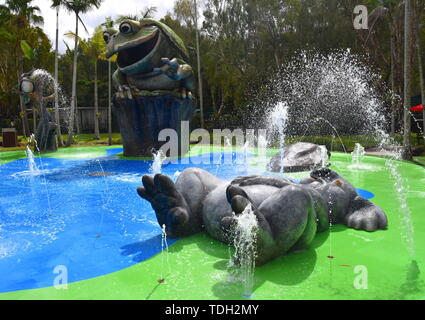 Beerwah, Australia - Apr 22, 2019. Water playground for kids with big frog, laying koala and crocodile sculptures in the Australia Zoo, which is locat Stock Photo