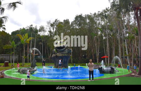 Beerwah, Australia - Apr 22, 2019. Water playground for kids with big frog, laying koala and crocodile sculptures in the Australia Zoo, which is locat Stock Photo