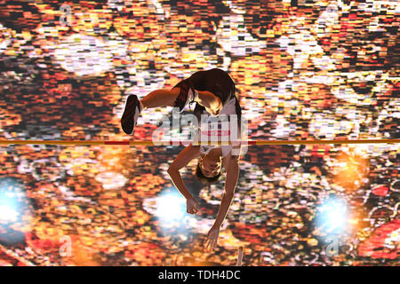 Beijing, China. 15th June, 2019. Zhang Wei competes to take a second place in the pole vault during the China Athletics Street Tour in Beijing, capital of China, June 15, 2019. Credit: Song Yanhua/Xinhua/Alamy Live News Stock Photo