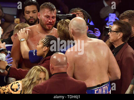 Las Vegas, USA. 15th June, 2019. LAS VEGAS, NEVADA - JUNE 15: Tyson Fury(R) talks with Tom Schwarz after the fight was stop in the second round fight at MGM Grand Garden Arena on June 15, 2019 in Las Vegas, Nevada. Tyson Fury took the win by took the win by TKO. Credit: ZUMA Press, Inc./Alamy Live News Stock Photo