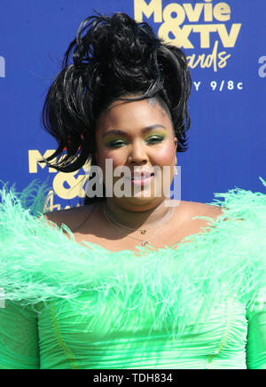 lizzo neon green dress Lizzo's Best Beauty Looks