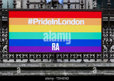 London, UK. 16th June, 2019. A Pride in London banner hangs on the railings of Royal Academy of Arts building in Piccadilly, as London prepares to celebrate Pride in London festival. Credit: Dinendra Haria/SOPA Images/ZUMA Wire/Alamy Live News Stock Photo
