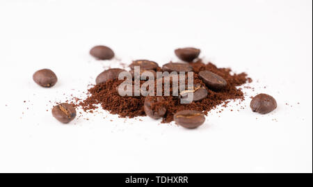 roasted coffee bean with powder isolated on white background Stock Photo