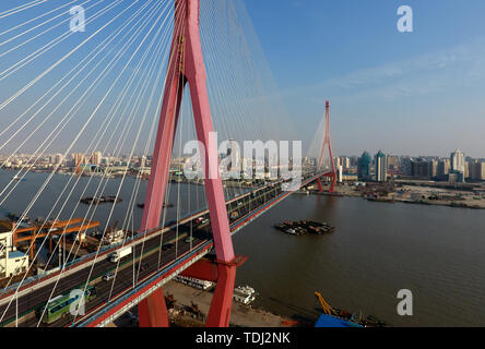 Bridge on the Huangpu River in Shanghai - Yangpu Bridge Stock Photo