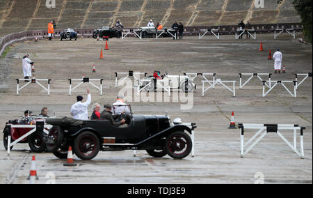 Cars from the VSCC (Vintage Sports Car Club) take part in driving tests during the Brooklands Double Twelve Motorsport Festival at Brooklands Museum, in Weybridge, Surrey. Stock Photo