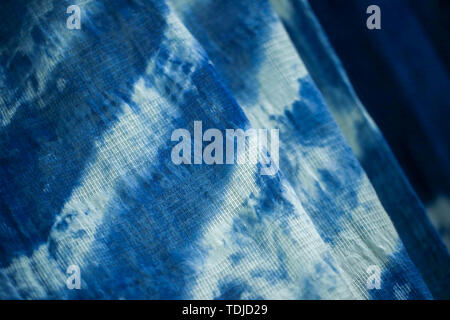Batik braid glowing dots abstract background Stock Photo