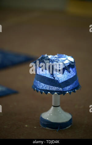 A lamp cover made of batik woven items. Stock Photo