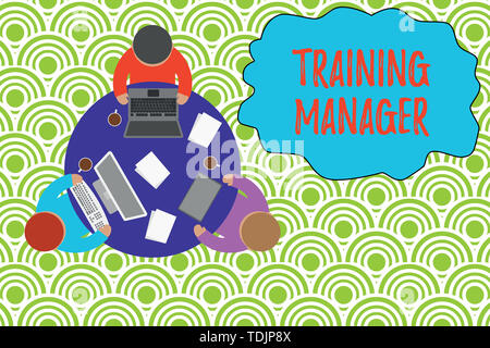 Text sign showing Training Manager. Business photo showcasing giving needed skills for high positions improvement Working round table male employees e Stock Photo