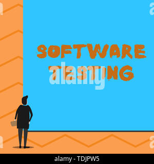 Text sign showing Software Testing. Business photo text investigation provide information about the quality of it Man stands in back view in front of  Stock Photo