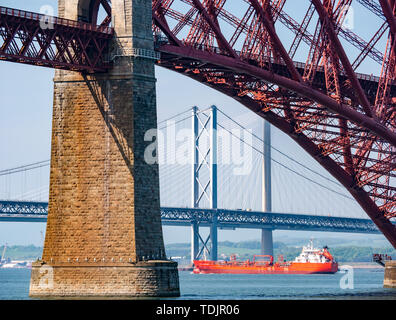 Georg Essberger, tanker ship, Firth of Forth with three bridges, under Forth Rail Bridge, Scotland, UK Stock Photo
