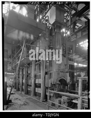O-ing press of the saw line in bay 7 of the main pipe mill building looking northeast. - U.S. Steel National Tube Works, Main Pipe Mill Building, Along Monongahela River, McKeesport, Allegheny County, PA; Carnegie, Andrew Stock Photo