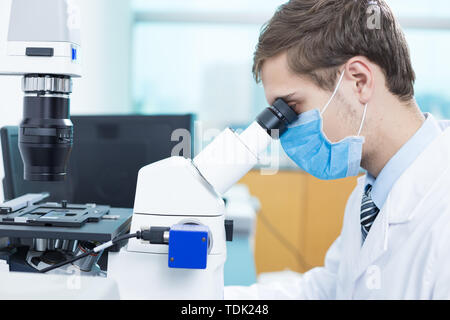 people doing medical experiment in lab Stock Photo