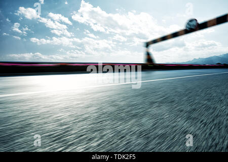 Empty asphalt road in blue cloudsky Stock Photo