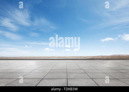 Empty marble floor with snow mountains Stock Photo