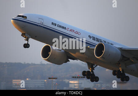 Los Angeles, California, USA. 15th June, 2019. An Air China Cargo Boeing 777 takes off from Los Angeles International Airport headed for Beijing. Credit: KC Alfred/ZUMA Wire/Alamy Live News Stock Photo